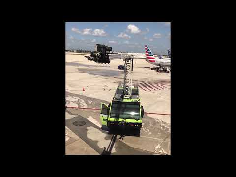 Airport Fire Truck Sprays Terminal