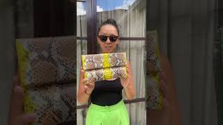 Genuine python skin yellow and brown clutch. Shop online via links in bio #bag #handbag #pythonbag