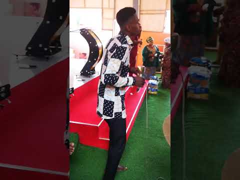 Holy Master play guitar @ church servise