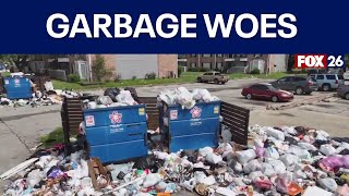 Waste management company sweeps in to help clean up Westbury Reserve Apartments