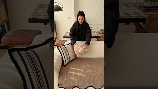 Cozy Modern Living Room with Cream Sofa & Minimal Decor