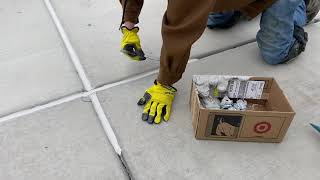 Sealing concrete control joints
