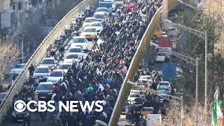 Protests erupt across Iran as currency sinks to record low