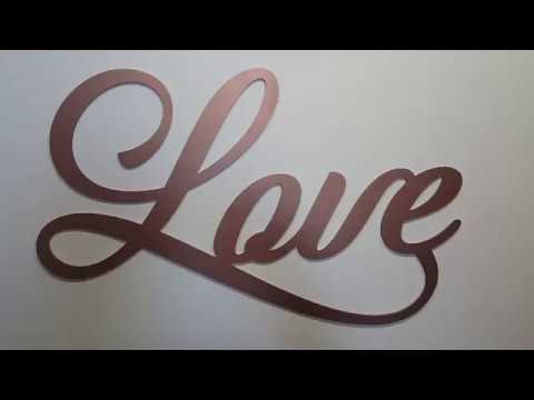 "Love" rose gold color, laser cut from mdf.