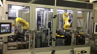 Optima Automated Assembly System Featuring FANUC Robotics | PMi2 Custom Solutions