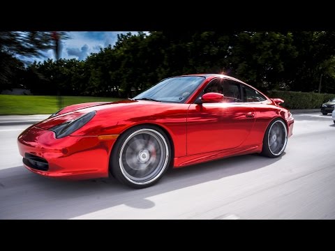 Wrapped up this silver Porsche in Avery Red chrome vinyl. - Car Wrap Company Near Me
