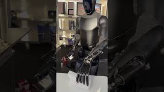 Tesla Robot waves, interacts and gets me popcorn. #fyp #viral #teslarobot #elonmusk #tesla