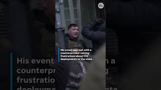 Conservative influencer Jake Lang escorted from Minneapolis protest