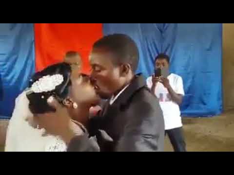 And the groom cannot stop kissing the bride
