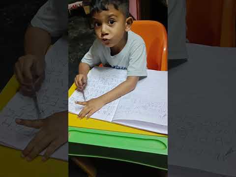 Piyush doing his writing assignment