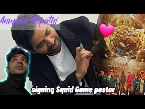 Anupam Tripathi signing a Squid Game poster 😃