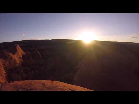 Sun setting in the canyon. Navajo Nation, Lupton Arizona-Manuelito New Mexico state line