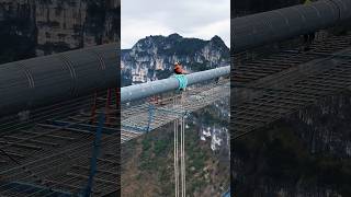 The world's tallest bridge under construction above the Huajiang Grand Canyon in Guizhou. #guizhou