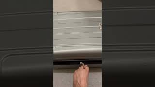 How to unzip a suitcase using your left foot!