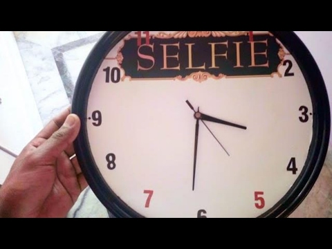 Clock make with waste material