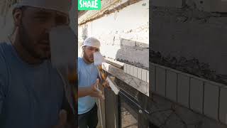 "Master Mason at Work: Stunning Brick Arch Window Roof