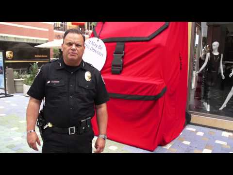 Fountain Valley Police Chief Giant Red Backpack PSA