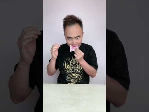 I bite a portion of the card #shorts #magic