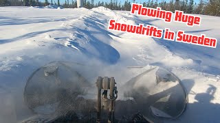Volvo L60h Busting Big Snow Drifts after Snowstorm