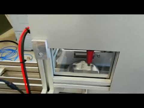 Production line-integrated ADP machine marking on fire estinguisher bases