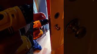 Taking the front door down.