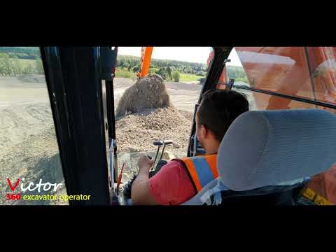 Muck Shifting using a excavator (HITACHI ZAXIS 210  )