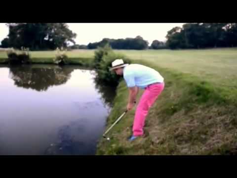 Drunk golfer falls in the water trying to hit golf ball