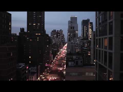 city at night skyline skyscraper nyc new yorknight lights aerial view flyover