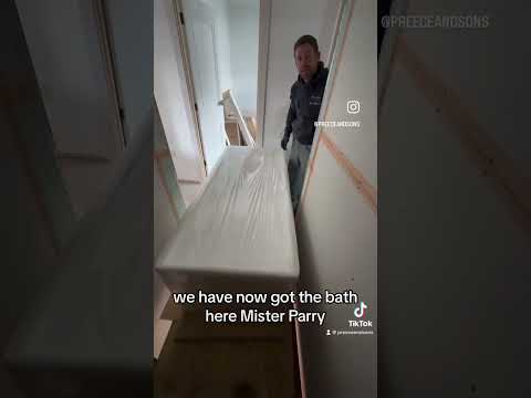Moving a 168kg lusso stone bath