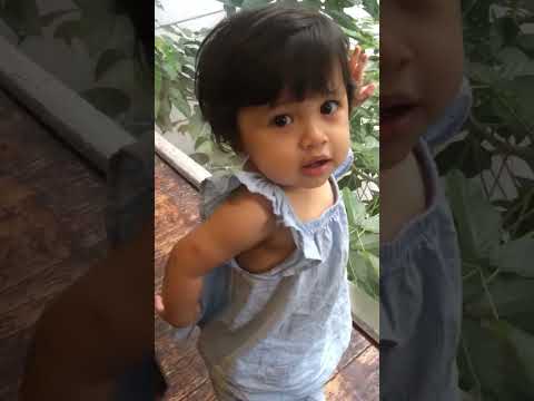 Baby first time walking outside.