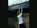 Me climbing under a canal bridge