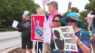 Protest held outside CDC over new COVID-19 shot guidelines