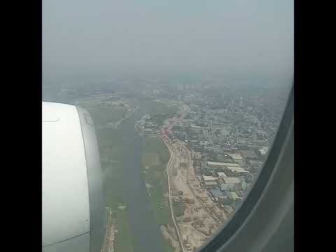 Airplane Landing in Vibrant Dhaka City. #travel #airport