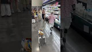 A Robot Takes Its Robot Dog Shopping