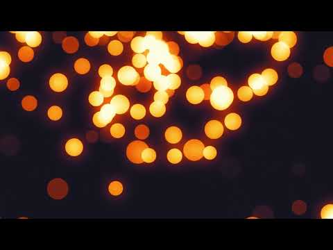 Warm Bokeh Light Loop Background | Soft Glowing Animation for Websites