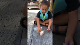 A little miner smashing into Oregon Sunstone Gemblox