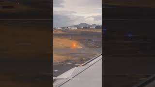 Plane taking off on a runway, view from a window#nature #airplan