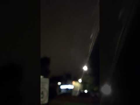 Laser lights blasting through UK night sky/ SW London England 1/2
