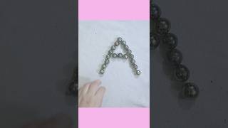 Fun with marbles #alphabet pattern with #marble #fun #art #shorts