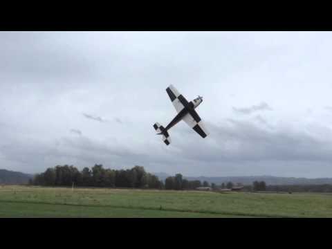 Extreme flight 78" extra in the wind and rain. Pilot: John