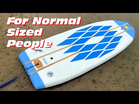 Large Human Splashes Down on a Paddleboard