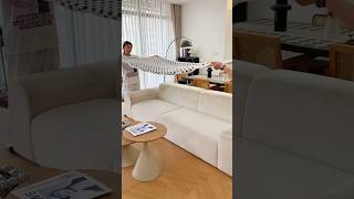 Modern Cozy Living Room with White Sofa & Geometric Throw Blanket