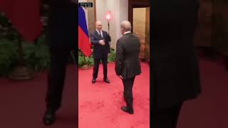 Putin gently asks for handshakes with Pakistani PM Sharif ahead of talks