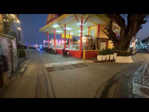 Walking to the night market in Koh Larn Thailand