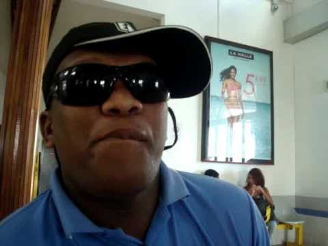 Maundrey singing_at Saint Louis bus station.