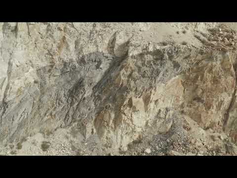 Los Frailes pit walls with massive sulphides (VMS) in dark (Emerita Resources)