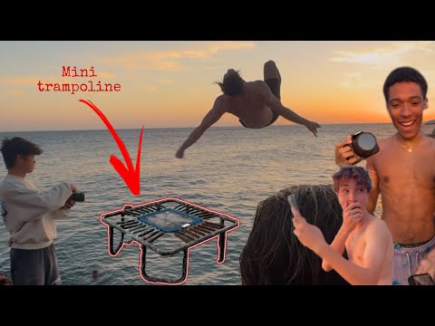 MINI TRAMPOLINE JUMP INTO THE OCEAN IN HAWAII *it got wild*