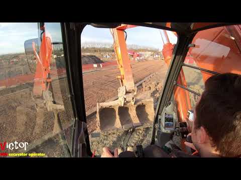 Excavator Grading Mud ( Hitachi 210 LC ZAXIS )