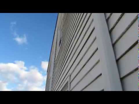 Siding Deflection During Light Breeze Shows Evidence of Sandy Damage