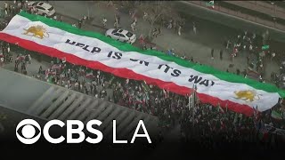 Thousands gather in downtown Los Angeles to protest Iranian regime